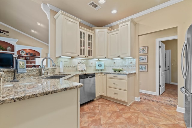 kitchen featuring a sink, crown molding, visible vents, and stainless steel appliances