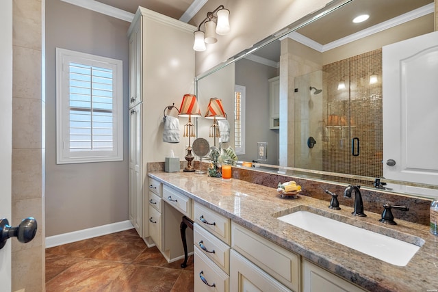 full bath featuring vanity, baseboards, a stall shower, and ornamental molding