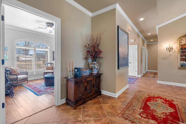 hallway featuring recessed lighting, crown molding, and baseboards