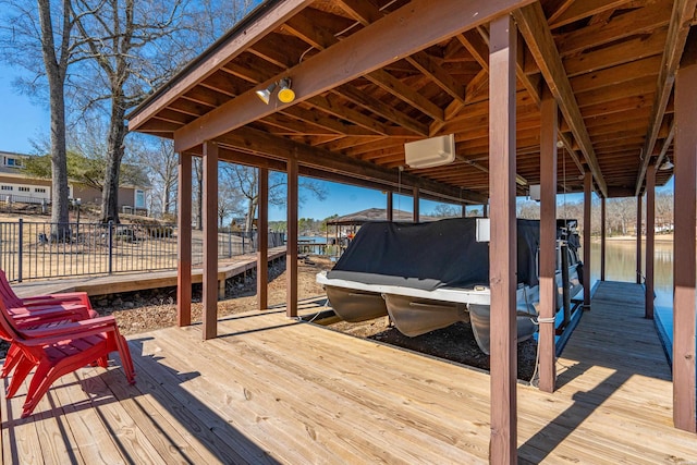 view of dock with boat lift