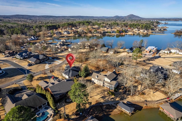 birds eye view of property featuring a residential view and a water view