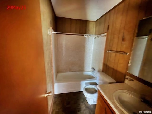 501 N Byrd St, Crossett, AR 71635 - bathroom featuring vanity, toilet, and tub / shower combination