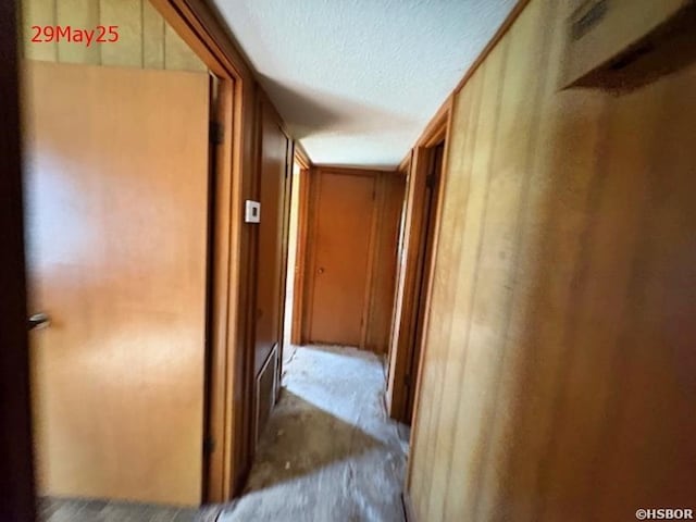 501 N Byrd St, Crossett, AR 71635 - corridor with a textured ceiling and carpet floors