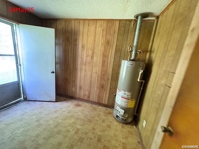 501 N Byrd St, Crossett, AR 71635 - utility room with gas water heater