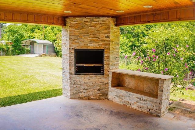 114 Roy Cir, Monticello, AR 71655 - view of patio / terrace with a fireplace