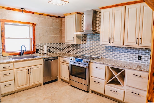 114 Roy Cir, Monticello, AR 71655 - kitchen featuring appliances with stainless steel finishes, wall chimney exhaust hood, a sink, and backsplash