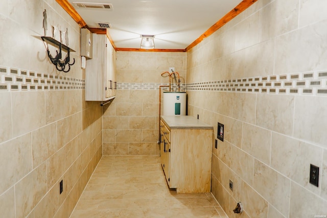 114 Roy Cir, Monticello, AR 71655 - bathroom with tile walls and water heater