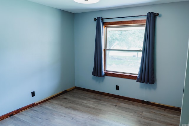 114 Roy Cir, Monticello, AR 71655 - spare room featuring wood finished floors and baseboards