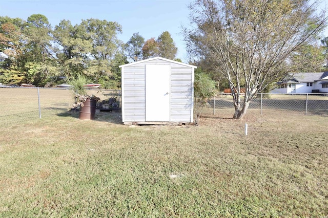 view of shed featuring a fenced backyard