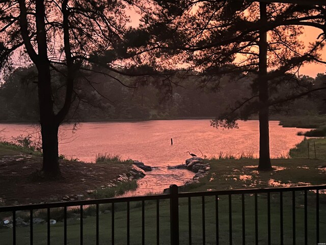 view of water feature featuring fence