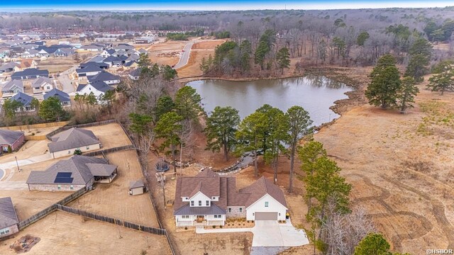 aerial view with a water view and a residential view