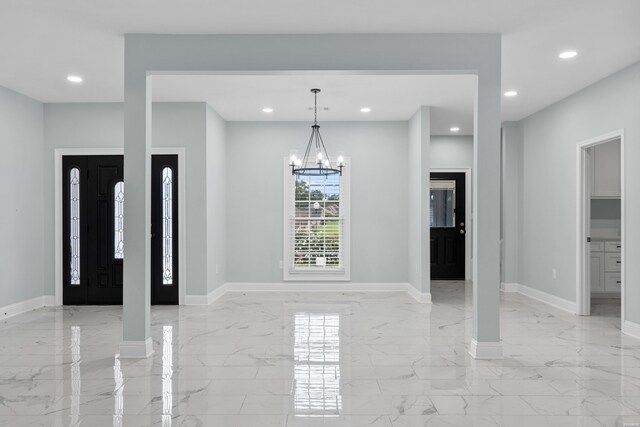 interior space with recessed lighting, marble finish floor, and baseboards