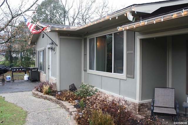 view of home's exterior with a patio area