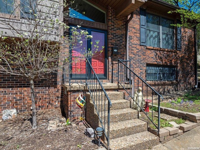 9925 Echo Valley Ct, Little Rock, AR 72227 - property entrance featuring brick siding