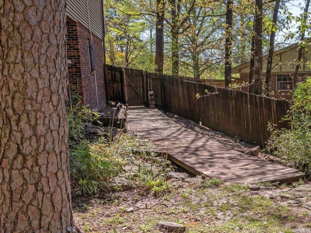 9925 Echo Valley Ct, Little Rock, AR 72227 - view of yard featuring a gate