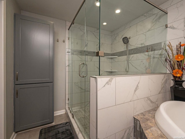 9925 Echo Valley Ct, Little Rock, AR 72227 - bathroom with a shower stall, recessed lighting, baseboards, and a tub to relax in
