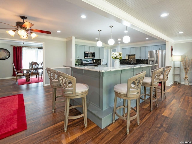 9925 Echo Valley Ct, Little Rock, AR 72227 - kitchen featuring appliances with stainless steel finishes, ornamental molding, recessed lighting, a sink, and baseboards