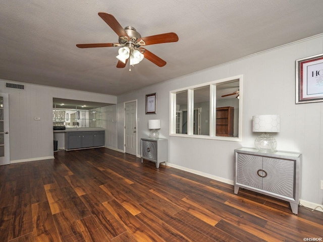 9925 Echo Valley Ct, Little Rock, AR 72227 - unfurnished living room featuring a ceiling fan, wood finished floors, and baseboards