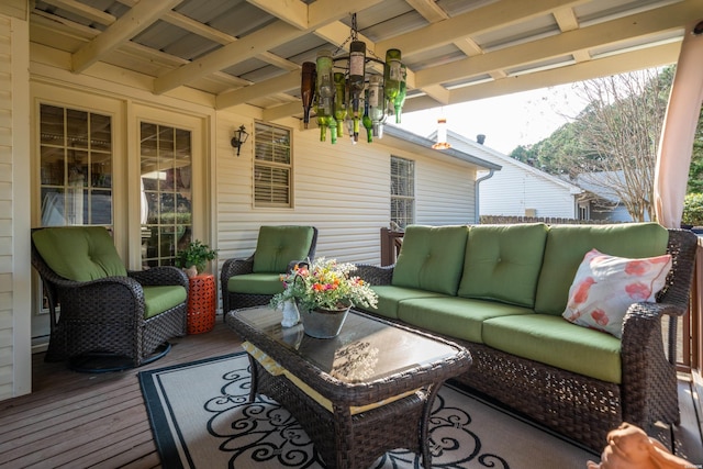 wooden deck with an outdoor living space