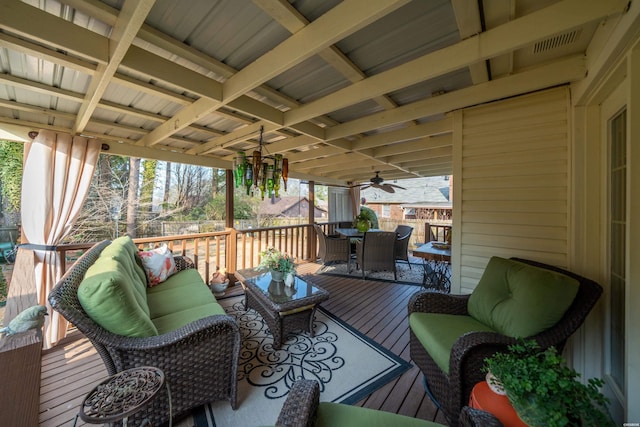 deck featuring visible vents and an outdoor hangout area