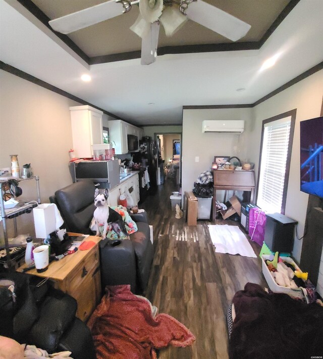 living area featuring ceiling fan, dark wood-type flooring, a wall mounted AC, and crown molding