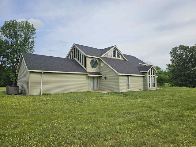 161 Funderburg Rd, Mineral Springs, AR 71851 - exterior space with a yard, cooling unit, and a shingled roof