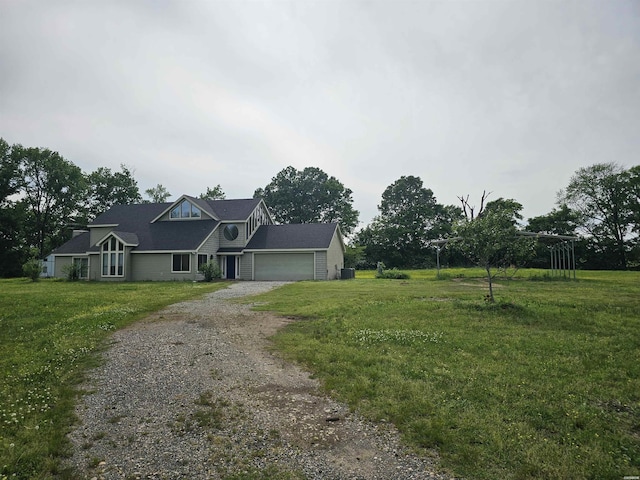161 Funderburg Rd, Mineral Springs, AR 71851 - view of front facade with a garage, dirt driveway, and a front lawn