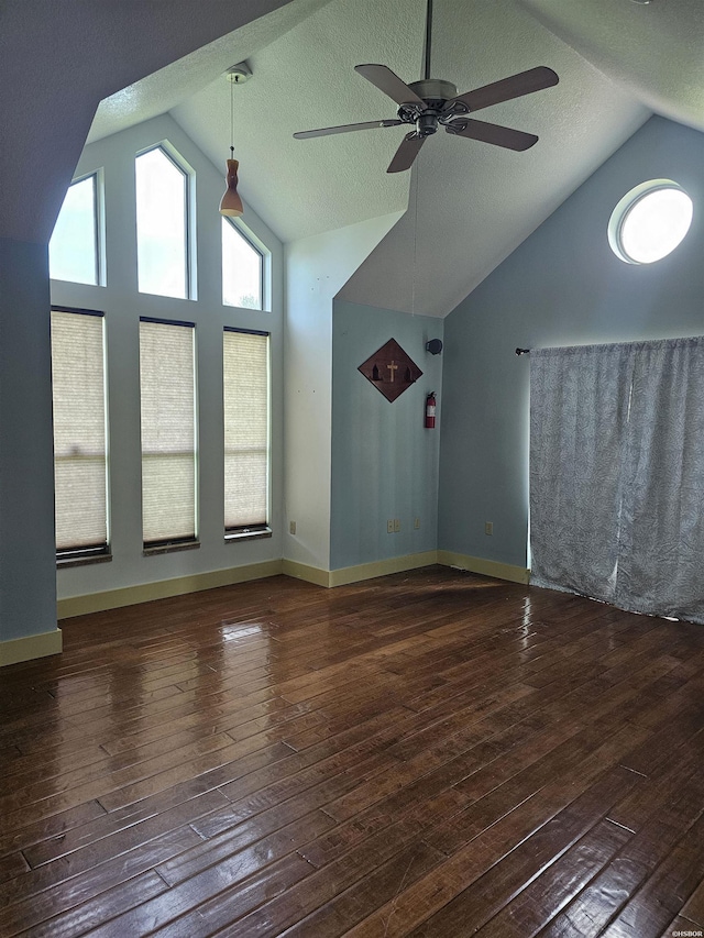 161 Funderburg Rd, Mineral Springs, AR 71851 - bonus room with lofted ceiling, hardwood / wood-style floors, baseboards, ceiling fan, and a textured ceiling