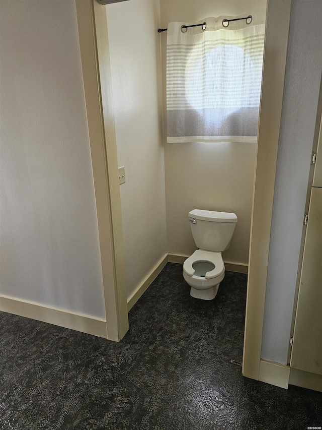 161 Funderburg Rd, Mineral Springs, AR 71851 - bathroom featuring toilet and baseboards