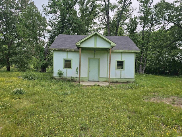 161 Funderburg Rd, Mineral Springs, AR 71851 - view of front facade with an outdoor structure and stucco siding