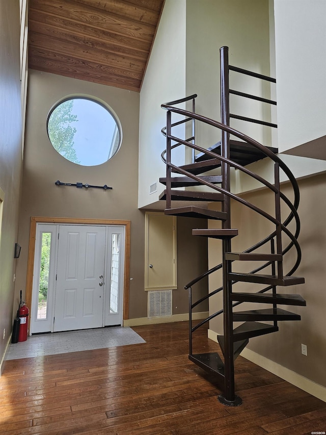161 Funderburg Rd, Mineral Springs, AR 71851 - foyer entrance with visible vents, stairs, hardwood / wood-style floors, and high vaulted ceiling