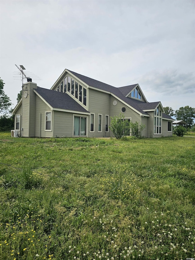161 Funderburg Rd, Mineral Springs, AR 71851 - exterior space featuring a lawn and a chimney