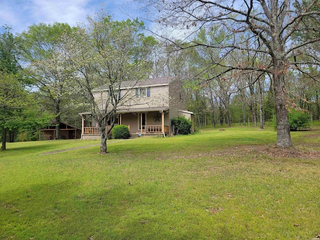 view of yard featuring a porch