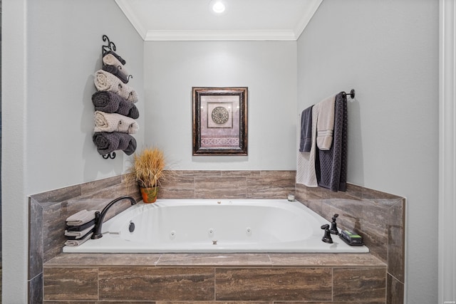 bathroom featuring a jetted tub and crown molding