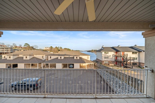 view of patio featuring a residential view and a balcony