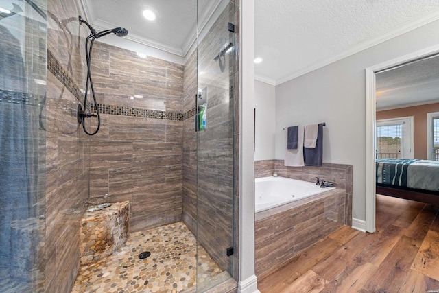 full bath with a shower stall, connected bathroom, wood finished floors, and ornamental molding