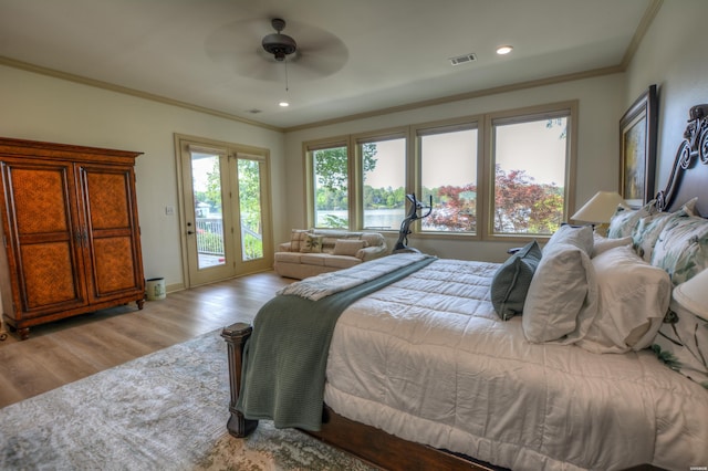 bedroom featuring recessed lighting, visible vents, light wood-style floors, access to outside, and crown molding