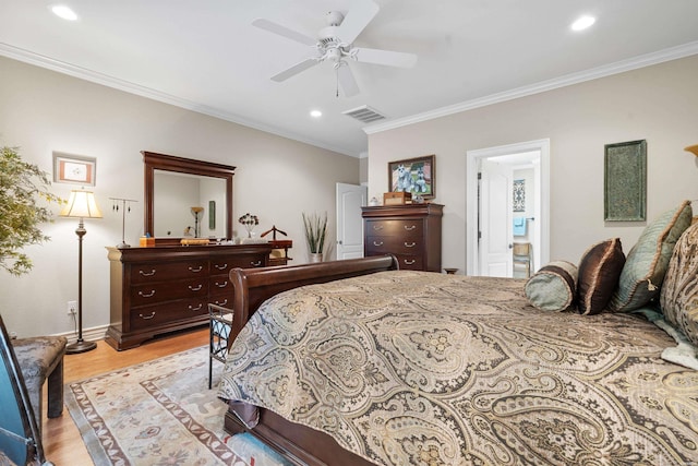 bedroom featuring light wood-style floors, visible vents, crown molding, and recessed lighting