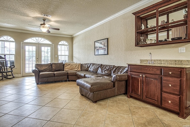 451 Lakeland Dr Unit G-4, Hot Springs, AR 71913 - living area with french doors, crown molding, light tile patterned floors, visible vents, and a textured ceiling