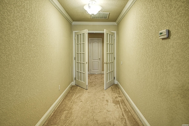 451 Lakeland Dr Unit G-4, Hot Springs, AR 71913 - hallway featuring visible vents, light colored carpet, a textured wall, crown molding, and french doors