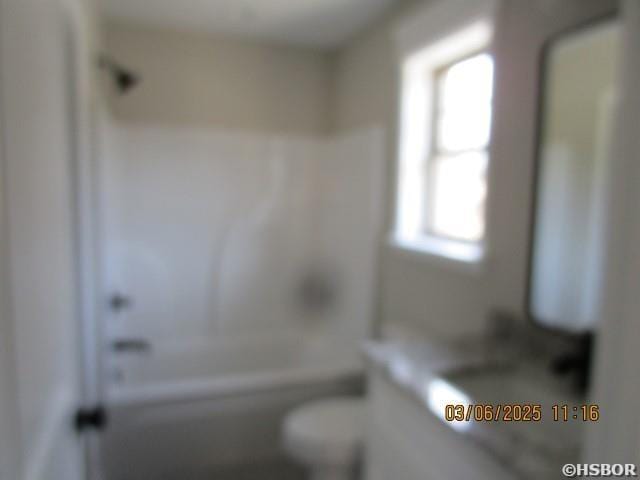 bathroom featuring toilet