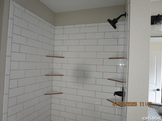 room details with a tile shower