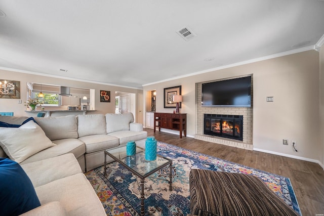 1201 Airport Rd Unit D-14, Hot Springs, AR 71913 - living area with ornamental molding, wood finished floors, a fireplace, and baseboards