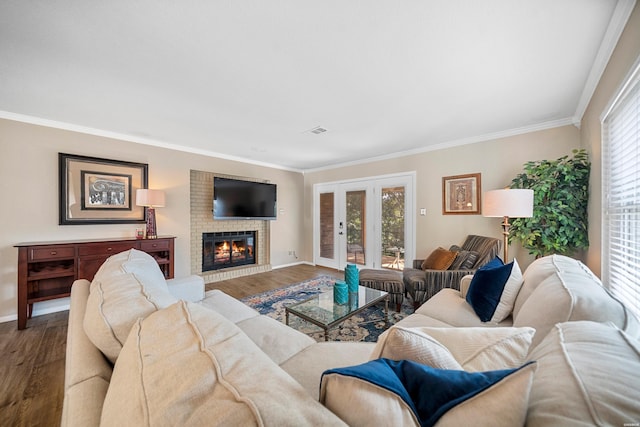 1201 Airport Rd Unit D-14, Hot Springs, AR 71913 - living area featuring baseboards, wood finished floors, crown molding, a fireplace, and french doors