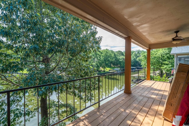 1201 Airport Rd Unit D-14, Hot Springs, AR 71913 - deck featuring a ceiling fan and view of wooded area