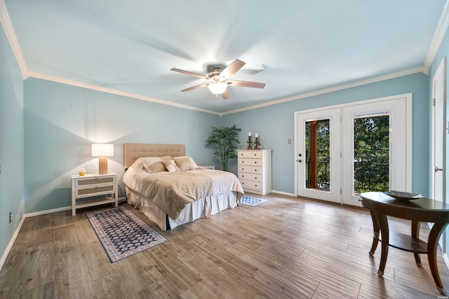 1201 Airport Rd Unit D-14, Hot Springs, AR 71913 - bedroom with access to exterior, baseboards, ornamental molding, wood finished floors, and ceiling fan