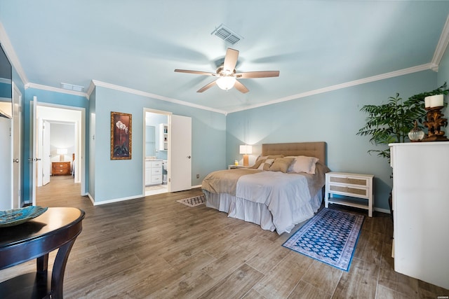 1201 Airport Rd Unit D-14, Hot Springs, AR 71913 - bedroom featuring ornamental molding, wood finished floors, baseboards, ensuite bath, and ceiling fan
