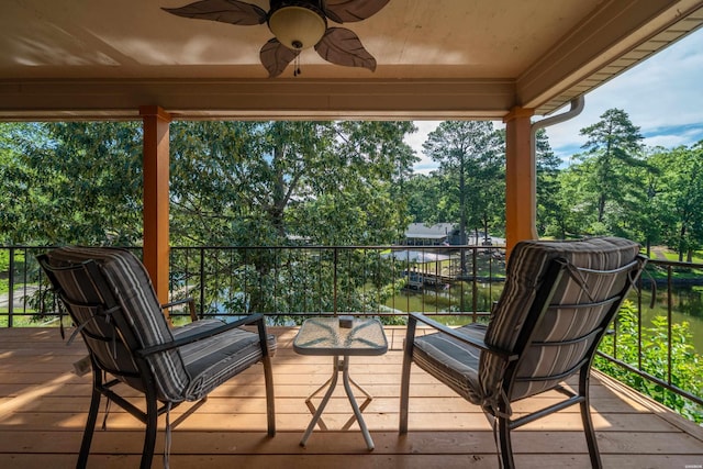 1201 Airport Rd Unit D-14, Hot Springs, AR 71913 - deck featuring a ceiling fan and view of scattered trees