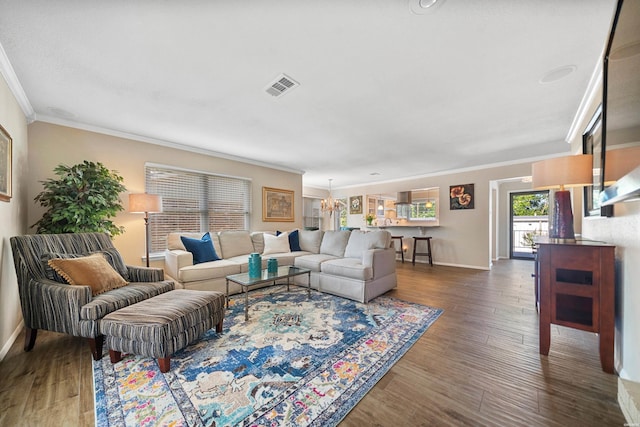 1201 Airport Rd Unit D-14, Hot Springs, AR 71913 - living room with ornamental molding, baseboards, dark wood-style flooring, and a chandelier