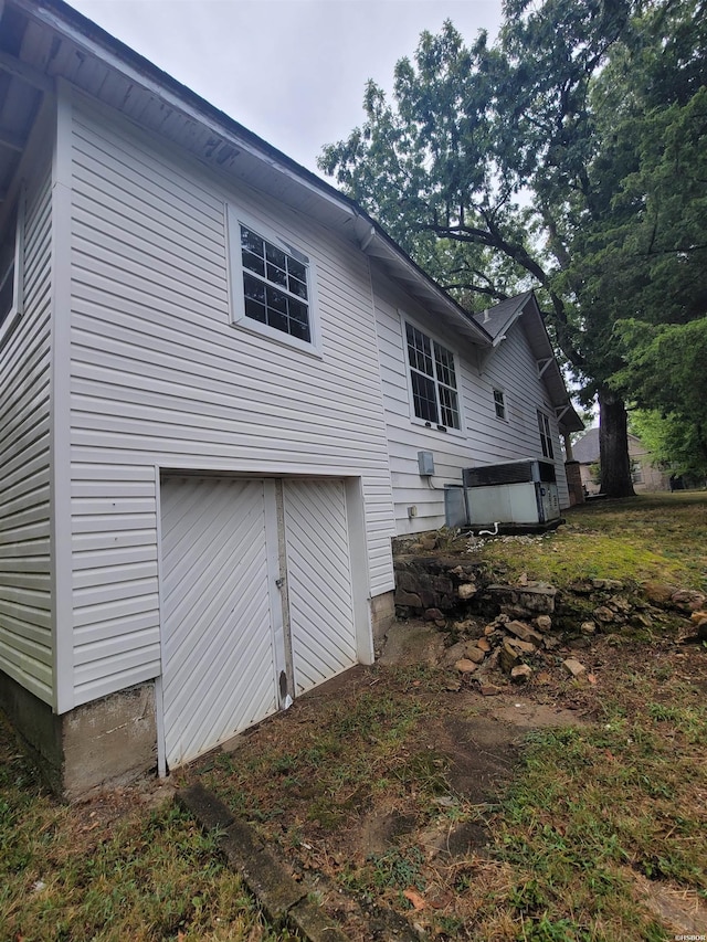 view of home's exterior with an attached garage